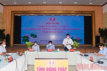 Chủ tịch Ủy ban nhân dân tỉnh Đồng Tháp Phạm Thiện Nghĩa phát biểu tại hội nghị Giao ban trực tuyến về công tác phòng, chống dịch Covid-19 (ảnh: HỮU NGHĨA).