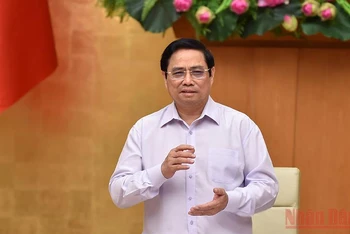 Thủ tướng Phạm Minh Chính trao đổi trực tuyến với lãnh đạo các địa phương. (Ảnh: Nhật Bắc)
