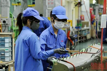 Sản xuất tại Công ty TNHH Mitsubishi Heavy Industries Việt Nam (Khu công nghiệp Bắc Thăng Long, Hà Nội). Ảnh: Trần Hải