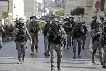 Lực lượng an ninh Israel được triển khai trong cuộc xung đột với người biểu tình Palestine tại thành phố Bethlehem, Khu Bờ Tây ngày 10/9. (Ảnh: AFP/TTXVN)