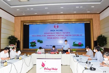 Chủ tịch UBND tỉnh Đồng Tháp Phạm Thiện Nghĩa phát biểu tại hội nghị.