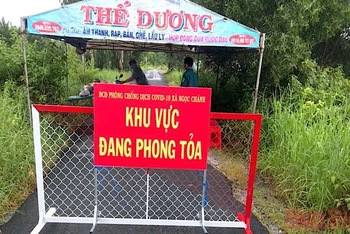Một khu vực phong toả ở xã Ngọc Chánh (huyện Đầm Dơi, tỉnh Cà Mau) vì có ca tái dương tính.