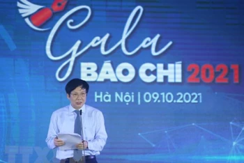 Phó Chủ tịch Thường trực Hội Nhà báo Việt Nam Hồ Quang Lợi phát biểu khai mạc. (Ảnh: Hoàng Hiếu/TTXVN)