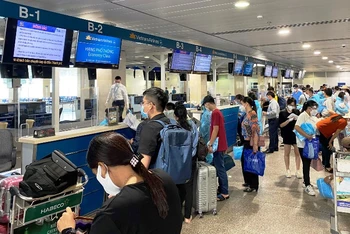 Hơn 600 người dân Bắc Ninh từ TP Hồ Chí Minh trở về địa phương trên 3 chuyến bay của Vietnam Airlines. (Ảnh: Hãng Vietnam Airlines cung cấp)