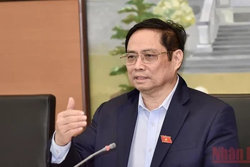 Thủ tướng Chính phủ Phạm Minh Chính phát biểu tại phiên thảo luận tổ, ngày 21/10. Ảnh: Linh Bắc
