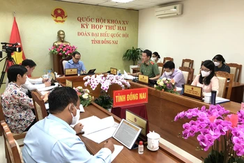 Quang cảnh buổi thảo luận tổ về dự án Luật Cảnh sát cơ động của Đoàn đại biểu Quốc hội tỉnh Đồng Nai.