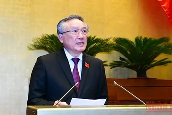 Chánh án Tòa án nhân dân tối cao Nguyễn Hòa Bình trình bày báo cáo về công tác của các Tòa án năm 2021. Ảnh: LINH NGUYÊN