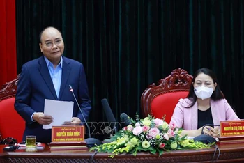 Chủ tịch nước Nguyễn Xuân Phúc tại buổi làm việc với Ban Chấp hành Đảng bộ tỉnh Ninh Bình. (Ảnh: TTXVN) 