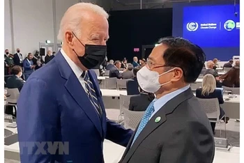 Thủ tướng Phạm Minh Chính gặp Tổng thống Mỹ Joe Biden. (Ảnh: TTXVN)