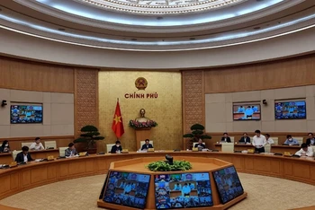 Phó Thủ tướng Lê Văn Thành chủ trì hội nghị trực tuyến tại trụ sở Chính phủ.