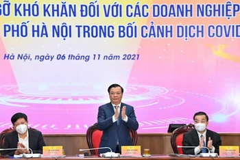 Hà Nội tổ chức Hội nghị “Đối thoại, tháo gỡ khó khăn đối với các doanh nghiệp trên địa bàn thành phố Hà Nội trong bối cảnh dịch Covid-19”. (Ảnh: DUY LINH)