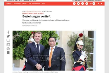 Báo Thế giới trẻ (Junge Welt) của Đức đăng tin về chuyến thăm Pháp của Thủ tướng Phạm Minh Chính. (Ảnh: TTXVN)
