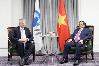Thủ tướng Phạm Minh Chính tiếp Tổ chức Hợp tác và Phát triển kinh tế (OECD) Mathias Cormann. (Ảnh: Dương Giang/TTXVN)