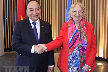 Chủ tịch nước Nguyễn Xuân Phúc gặp bà Tatiana Valoya, Tổng Giám đốc Văn phòng Liên hợp quốc tại Geneva. (Ảnh: Thống Nhất/TTXVN)