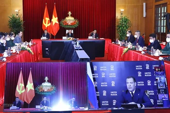 Các đại biểu dự hội nghị trực tuyến tại điểm cầu Hà Nội. (Ảnh: TTXVN)