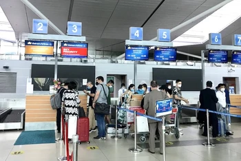 Từ ngày 1/12, Vietnam Airlines triển khai dịch vụ làm thủ tục trực tuyến trên website và ứng dụng di động cho hành khách đi từ sân bay Phú Quốc. (Ảnh: VNA).