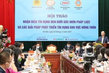 Phó Thống đốc Thường trực Ngân hàng Nhà nước Đào Minh Tú phát biểu tại hội thảo.