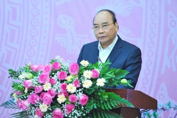 Chủ tịch nước Nguyễn Xuân Phúc phát biểu tại Hội nghị. (Ảnh: Minh Đức/TTXVN)