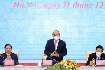  Chủ tịch nước Nguyễn Xuân Phúc chủ trì hội thảo về Nhà nước pháp quyền xã hội chủ nghĩa Việt Nam. (Ảnh: Thống Nhất/TTXVN) 