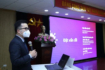 PGS.TS Trần Xuân Bách trình bày các số liệu nghiên cứu tại hội thảo.