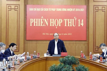 Chủ tịch nước Nguyễn Xuân Phúc phát biểu ý kiến tại phiên họp. (Ảnh: TXVN)