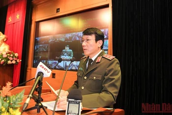Trung tướng Lương Tam Quang, Thứ trưởng Công an phát biểu tại hội nghị. (Ảnh: LÊ TÚ)