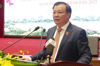 Ủy viên Bộ Chính trị, Bí thư Thành ủy Hà Nội Đinh Tiến Dũng phát biểu tại buổi gặp mặt. (Ảnh: TTXVN)
