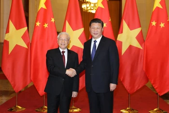 Tổng Bí thư Nguyễn Phú Trọng và Tổng Bí thư, Chủ tịch nước Trung Quốc Tập Cận Bình. Ảnh: TTXVN
