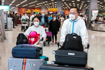 Du khách Trung Quốc nhập cảnh tại sân bay quốc tế Suvarnabhumi, Thái Lan hôm 1/2. (Ảnh: REUTERS)