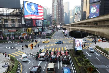 Từ 1/4, Malaysia mở cửa đón khách quốc tế mà không cần cách ly. (Ảnh: REUTERS)