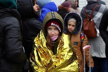 Người tị nạn Ukraine đi sơ tán đến Przemysl, Ba Lan, ngày 7/3/2022. (Ảnh: Reuters)