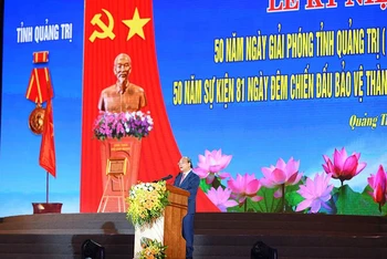 Chủ tịch nước Nguyễn Xuân Phúc phát biểu tại Lễ kỷ niệm 50 năm Ngày Giải phóng tỉnh Quảng Trị; 50 năm sự kiện 81 ngày đêm bảo vệ Thành cổ Quảng Trị. (Ảnh: THÀNH ĐẠT)