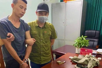 Đối tượng Phan Minh Châu bị công an bắt giữ.
