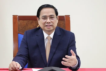 Thủ tướng Phạm Minh Chính tại cuộc điện đàm với Thủ tướng Nội các Hàn Quốc Han Duck-soo.