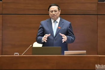 Thủ tướng Phạm Minh Chính trả lời chất vấn của đại biểu Quốc hội. (Ảnh: ĐĂNG KHOA) 