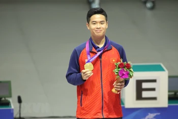 Thành tích ấn tượng của Quang Huy giúp Đoàn Thể thao Việt Nam có Huy chương Vàng đầu tiên tại ASIAD 19. (Ảnh: TTXVN phát)