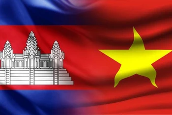 Cờ Việt Nam và Campuchia. (Nguồn: Khmertimeskh.com/TTXVN)
