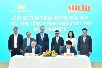 Lãnh đạo Báo Nhân Dân và Vietnam Airlines ký thỏa thuận hợp tác toàn diện.