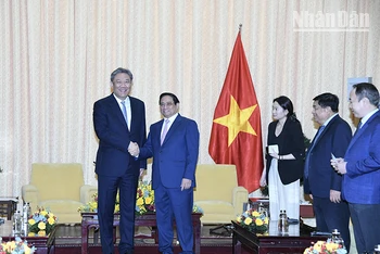 Thủ tướng Phạm Minh Chính và Bộ trưởng Thương mại Trung Quốc Vương Văn Đào.