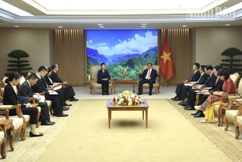 [Ảnh] Thủ tướng Phạm Minh Chính tiếp Bộ trưởng Bộ Tư pháp Trung Quốc Hạ Vinh
