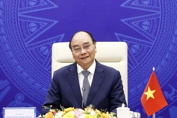 Chủ tịch nước Nguyễn Xuân Phúc phát biểu tại phiên khai mạc Hội nghị Thượng đỉnh trực tuyến “Tiếng nói phương Nam”. (Ảnh: TTXVN)