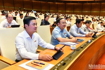 Các đại biểu Quốc hội dự phiên họp ở hội trường ngày 8/6. (Ảnh: ĐĂNG KHOA)