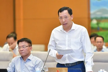 Thứ trưởng Công an Lê Văn Tuyến phát biểu ý kiến tại phiên họp Ủy ban Thường vụ Quốc hội sáng 13/9. (Ảnh: DUY LINH)