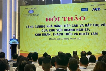 Phó Thống đốc Thường trực Ngân hàng Nhà nước Đào Minh Tú phát biểu khai mạc Hội thảo.