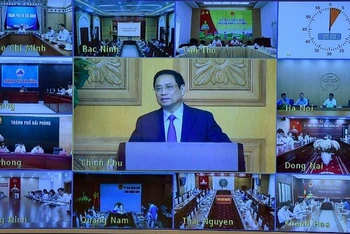 Sáng 30/7, Thủ tướng Phạm Minh Chính chủ trì cuộc đối thoại với hiệp hội, doanh nghiệp Hàn Quốc tại Việt Nam. (Ảnh: TRẦN HẢI)