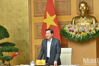 Phó Thủ tướng Lê Minh Khái phát biểu tại buổi làm việc với Ủy ban Giám sát tài chính quốc gia, ngày 13/11/2024. Ảnh: VGP