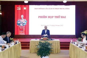 Chủ tịch nước Nguyễn Xuân Phúc, Trưởng Ban Chỉ đạo Cải cách Tư pháp Trung ương phát biểu tại phiên họp. (Ảnh: TTXVN)