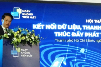 Phó Thống đốc Ngân hàng Nhà nước Phạm Tiến Dũng phát biểu tại Hội thảo.