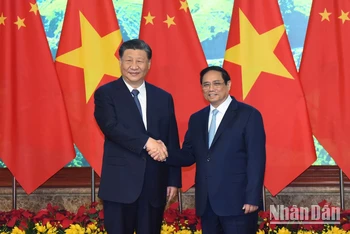 Thủ tướng Phạm Minh Chính đón Tổng Bí thư, Chủ tịch Trung Quốc Tập Cận Bình tại buổi hội kiến.