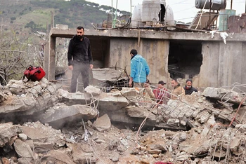 Khu nhà ở Liban bị phá hủy trong đợt không kích của Israel. (Ảnh: TÂN HOA XÃ)